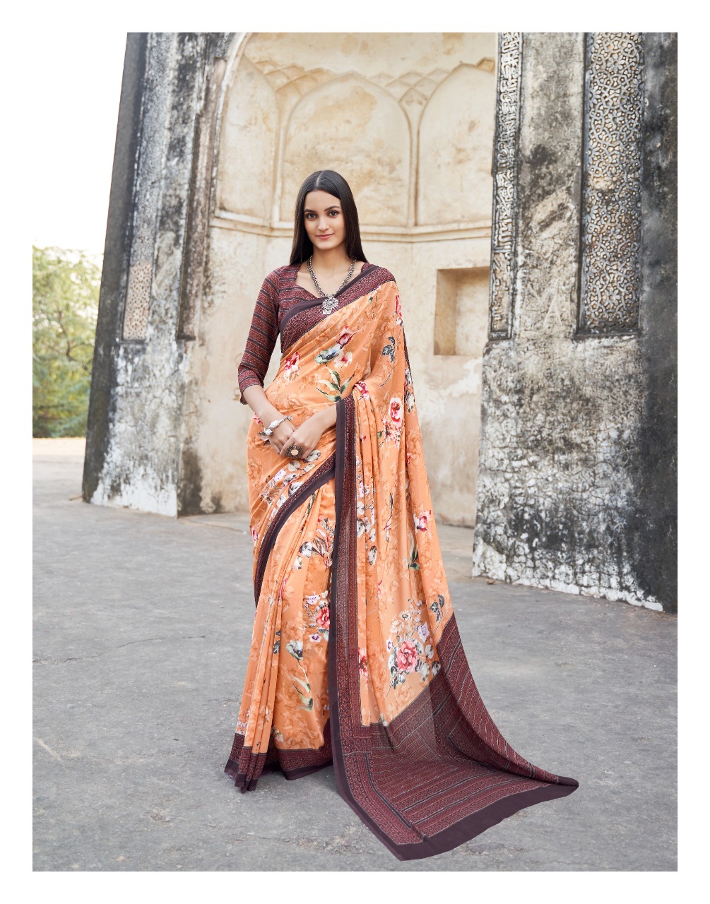 Bela Present Shapphire Georgette Crape Printed Saree Wholesaler