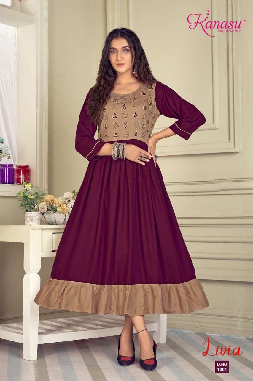 KANASU LIVIA HEAVY REYON LONG & FLAIR EMBROIDERY WITH SWAROVSKI WORK KURTI CATALOG WHOESALER BEST RATE